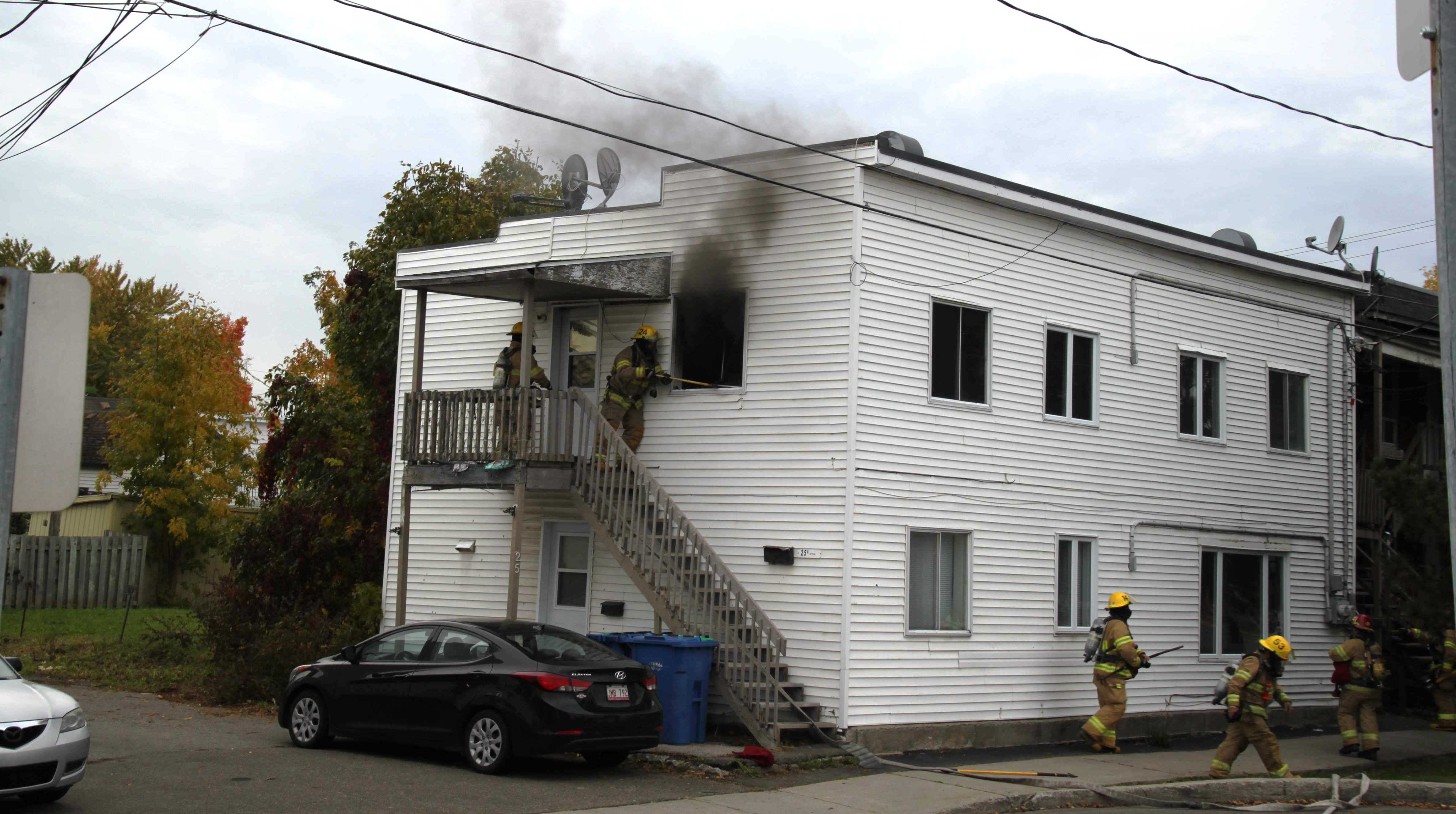 Image illustrant l'article: Une famille du quartier Champlain sur le pavé